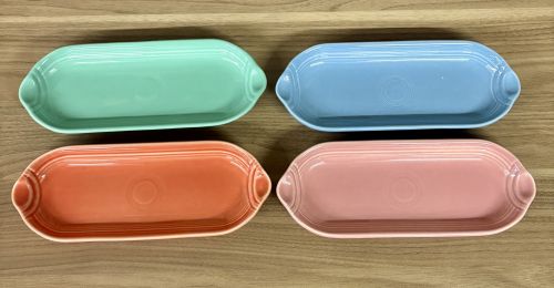 A Set of Four Homer Laughlin Fiesta Glazed Ceramic Bread Trays