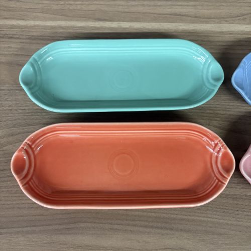 A Set of Four Homer Laughlin Fiesta Glazed Ceramic Bread Trays