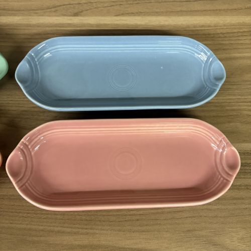 A Set of Four Homer Laughlin Fiesta Glazed Ceramic Bread Trays