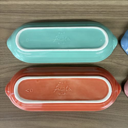 A Set of Four Homer Laughlin Fiesta Glazed Ceramic Bread Trays