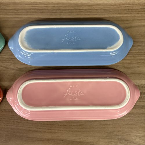 A Set of Four Homer Laughlin Fiesta Glazed Ceramic Bread Trays