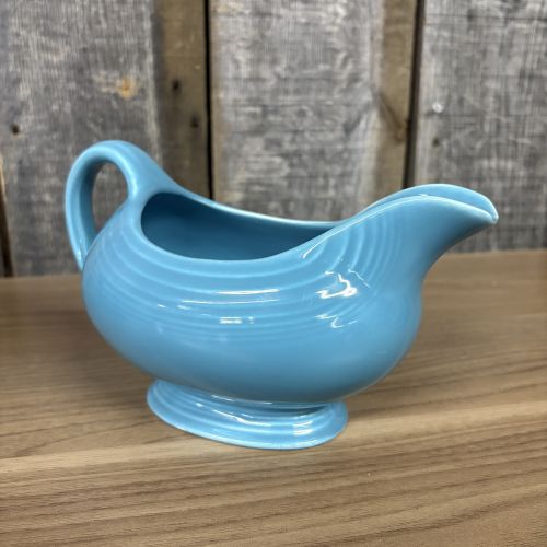 A Pair of Vintage Turquoise Fiestaware Serving Pieces including Lidded Casserole and Gravy Boat