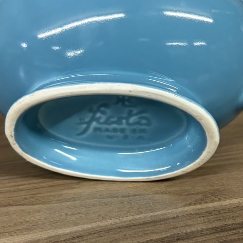 A Pair of Vintage Turquoise Fiestaware Serving Pieces including Lidded Casserole and Gravy Boat