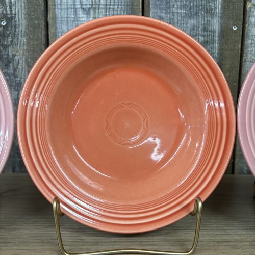 A Trio of Homer Laughlin Fiesta Rim Soup Bowls in Rose and Persimmon