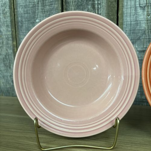A Trio of Homer Laughlin Fiesta Rim Soup Bowls in Rose and Persimmon