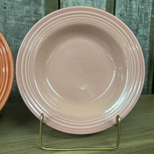 A Trio of Homer Laughlin Fiesta Rim Soup Bowls in Rose and Persimmon