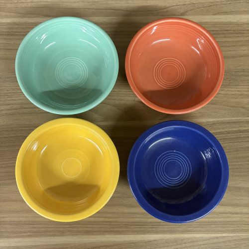 A Set of Four Fiesta Ceramic Fruit Bowls in Assorted Colors