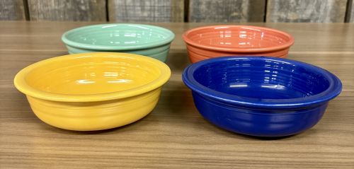 A Set of Four Fiesta Ceramic Fruit Bowls in Assorted Colors