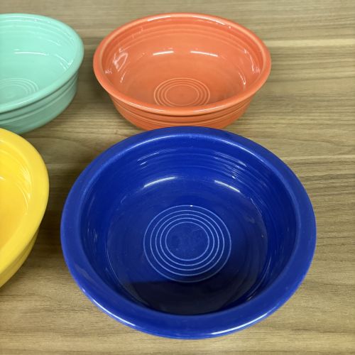 A Set of Four Fiesta Ceramic Fruit Bowls in Assorted Colors