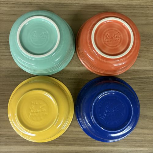 A Set of Four Fiesta Ceramic Fruit Bowls in Assorted Colors
