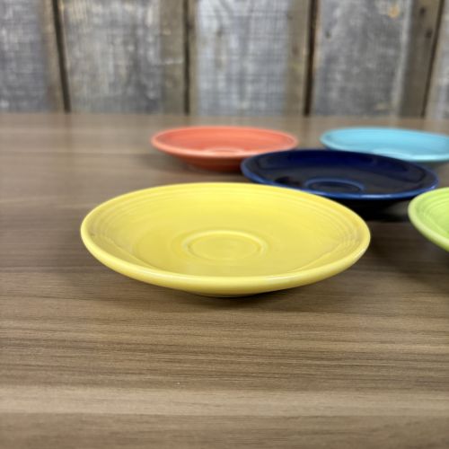 A Set of Five Homer Laughlin Fiesta Ceramic Saucers in Assorted Colors
