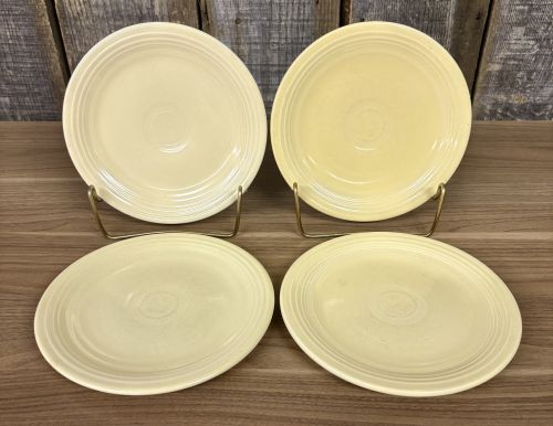A Set of Four Homer Laughlin Fiesta Yellow Bread and Butter Plates