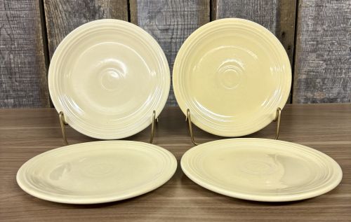 A Set of Four Homer Laughlin Fiesta Yellow Bread and Butter Plates