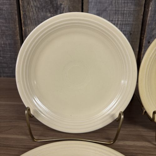 A Set of Four Homer Laughlin Fiesta Yellow Bread and Butter Plates