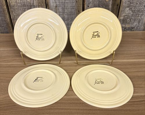 A Set of Four Homer Laughlin Fiesta Yellow Bread and Butter Plates