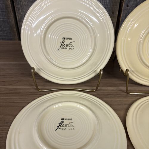 A Set of Four Homer Laughlin Fiesta Yellow Bread and Butter Plates