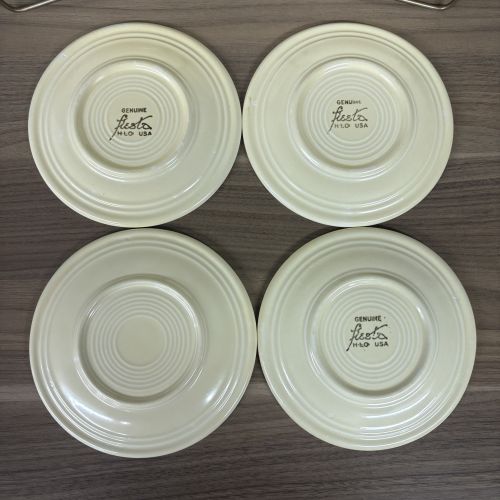 A Set of Six Homer Laughlin Fiesta Yellow Glazed Ceramic Plates