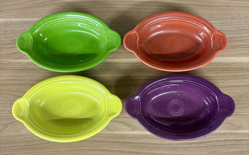 A Set of Seven Homer Laughlin Fiesta Individual Oval Casserole Dishes