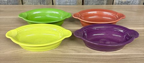 A Set of Seven Homer Laughlin Fiesta Individual Oval Casserole Dishes