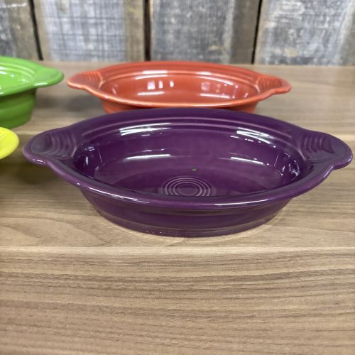 A Set of Seven Homer Laughlin Fiesta Individual Oval Casserole Dishes