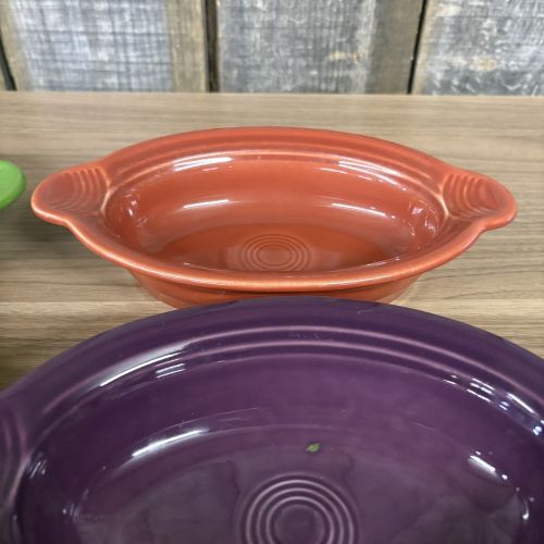 A Set of Seven Homer Laughlin Fiesta Individual Oval Casserole Dishes