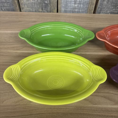 A Set of Seven Homer Laughlin Fiesta Individual Oval Casserole Dishes