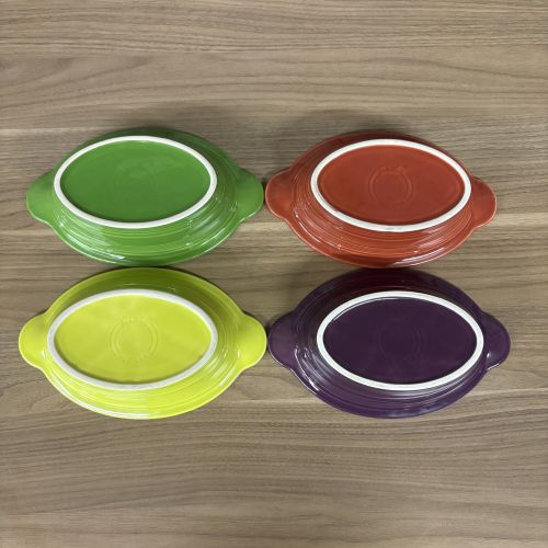 A Set of Seven Homer Laughlin Fiesta Individual Oval Casserole Dishes