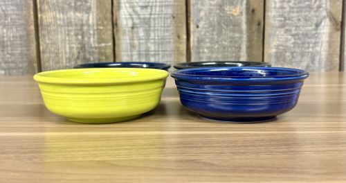 A Set of Four Fiesta Ceramic Fruit Bowls in Cobalt Blue Black and Chartreuse