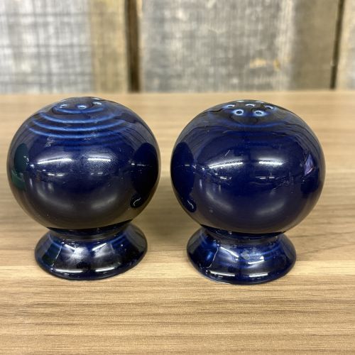 A Collection of Homer Laughlin Fiesta Tableware in Sea Mist and Cobalt Blue