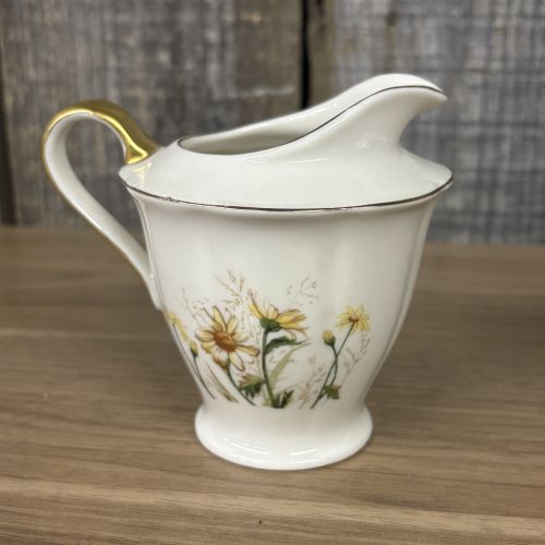A Pair of Theodore Haviland New York Porcelain Shasta Pattern Creamer and Covered Sugar Bowl