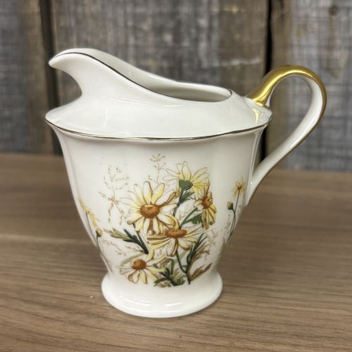 A Pair of Theodore Haviland New York Porcelain Shasta Pattern Creamer and Covered Sugar Bowl