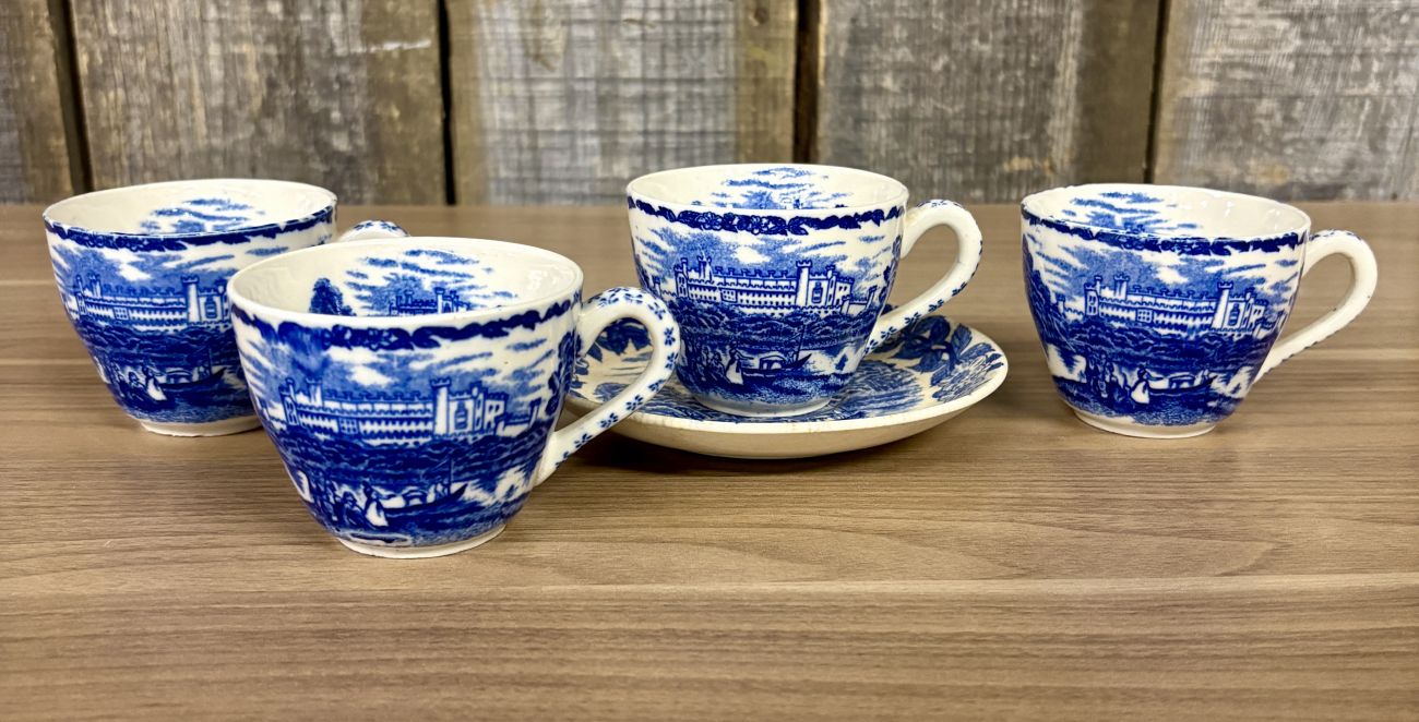 Four Blue and White Transfer-Printed Earthenware Teacups and One Saucer Featuring Windsor Castle