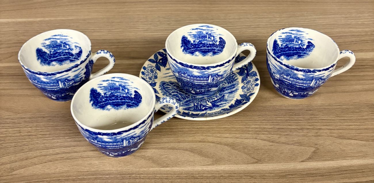 Four Blue and White Transfer-Printed Earthenware Teacups and One Saucer Featuring Windsor Castle