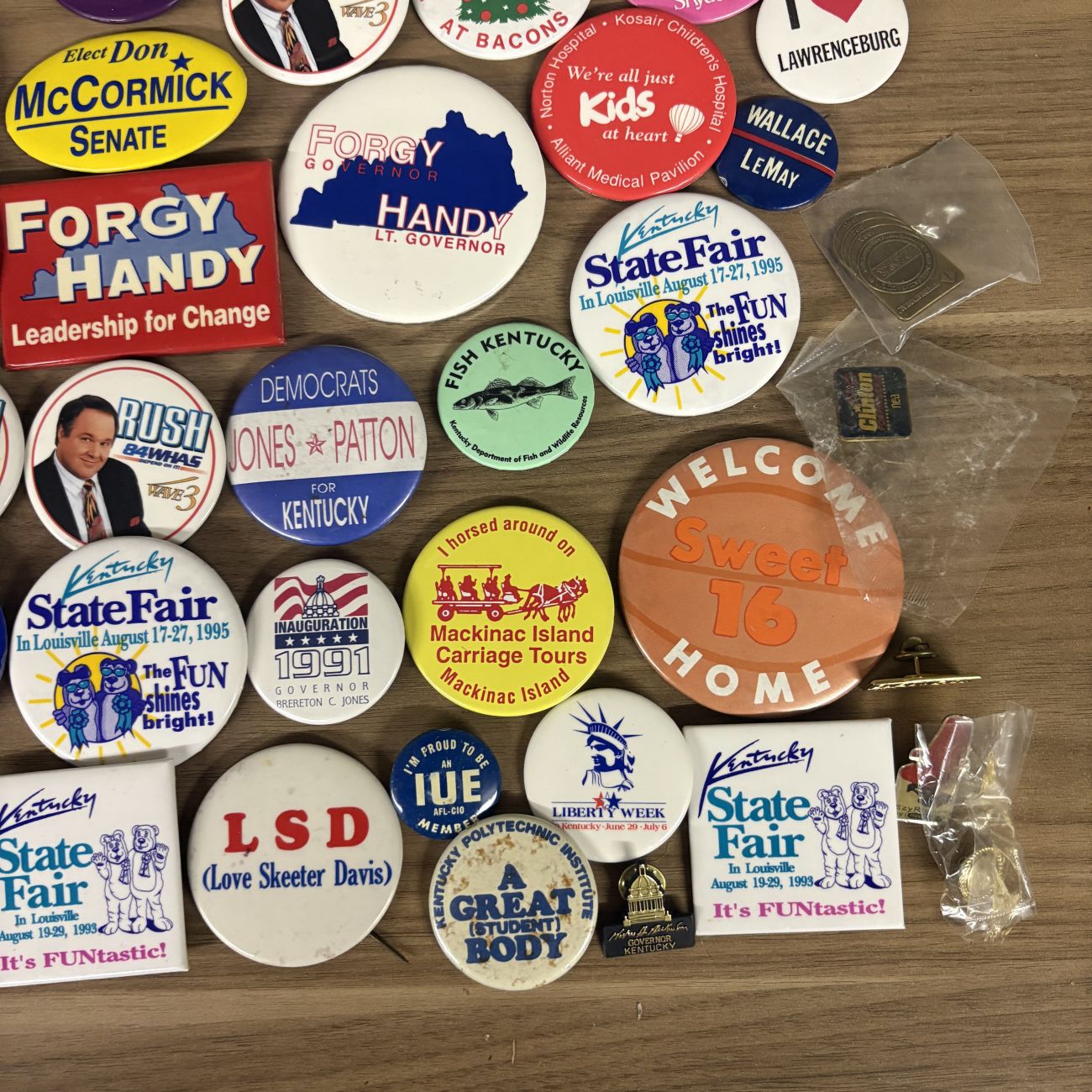 An Assortment of Vintage Kentucky Interest Pinback Buttons and Lapel Pins, 1980s-1990s
