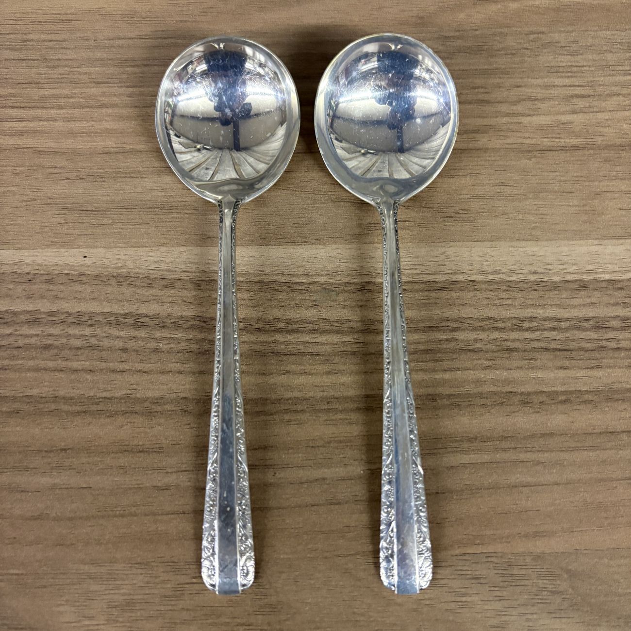 A Pair of Towle Sterling Silver Candlelight Pattern Cream Soup Spoons
