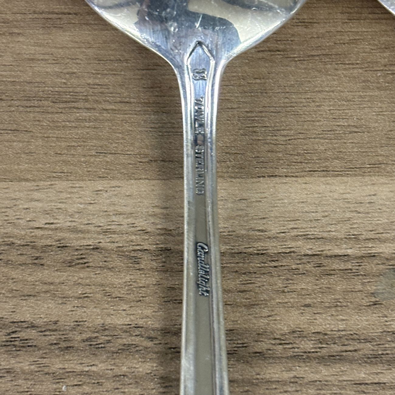 A Pair of Towle Sterling Silver Candlelight Pattern Cream Soup Spoons