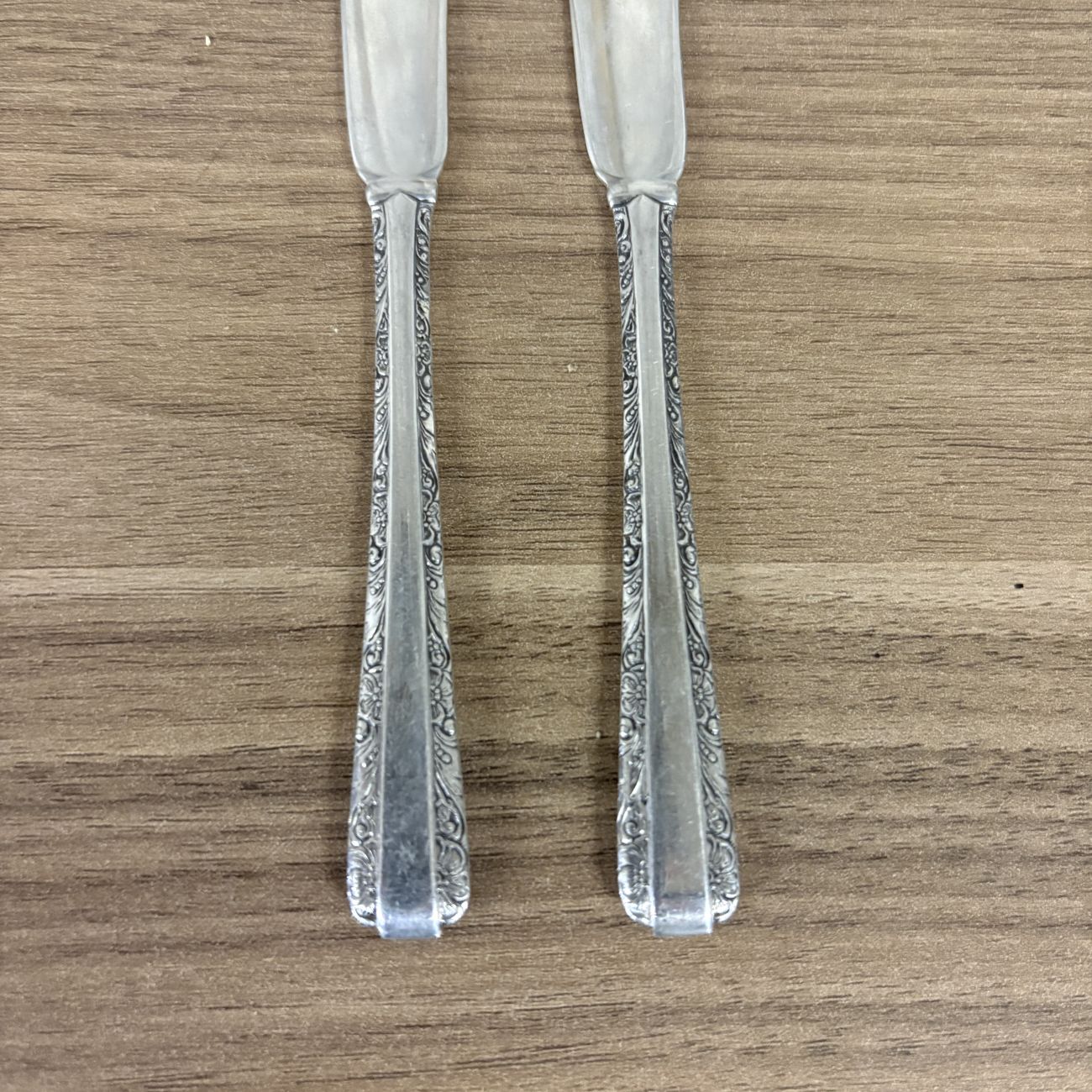 A Pair of Towle Sterling Silver Flat Handle Butter Spreaders in the Candlelight Pattern