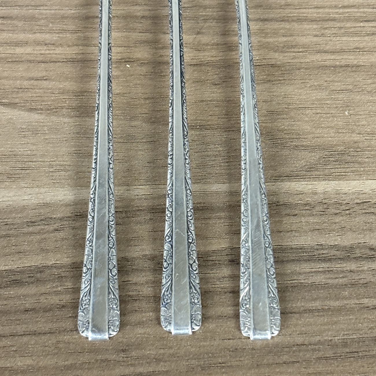 A Trio of Towle Sterling Silver Cocktail Forks in the Candlelight Pattern