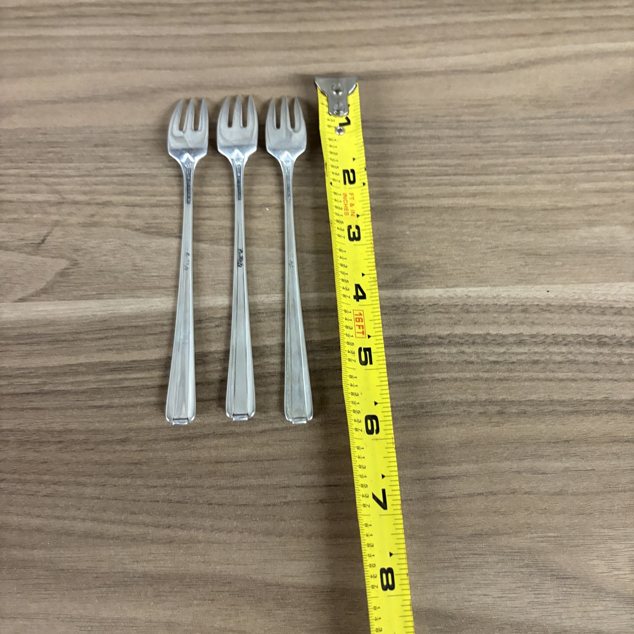 A Trio of Towle Sterling Silver Cocktail Forks in the Candlelight Pattern