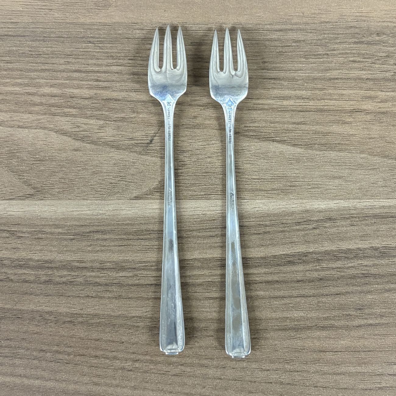 A Pair of Towle Sterling Silver Cocktail Forks in the Candlelight Pattern