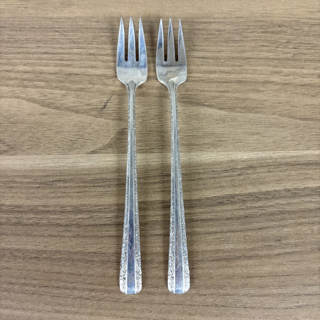 A Pair of Towle Sterling Silver Cocktail Forks in the Candlelight Pattern