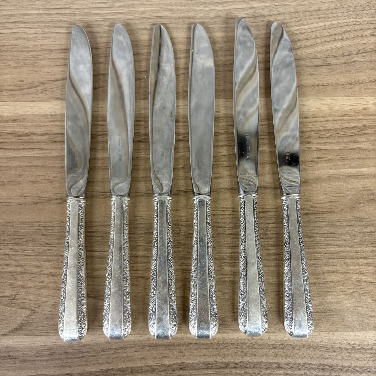 A Set of Six Towle Sterling Silver Handled Dinner Knives in the Rambler Rose Pattern