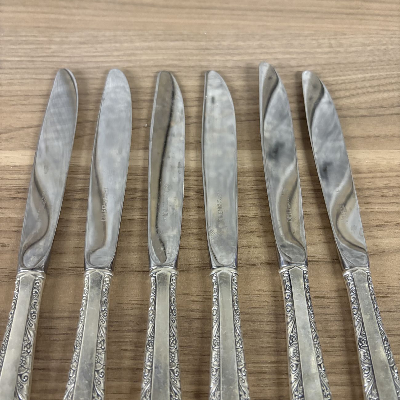 A Set of Six Towle Sterling Silver Handled Dinner Knives in the Rambler Rose Pattern