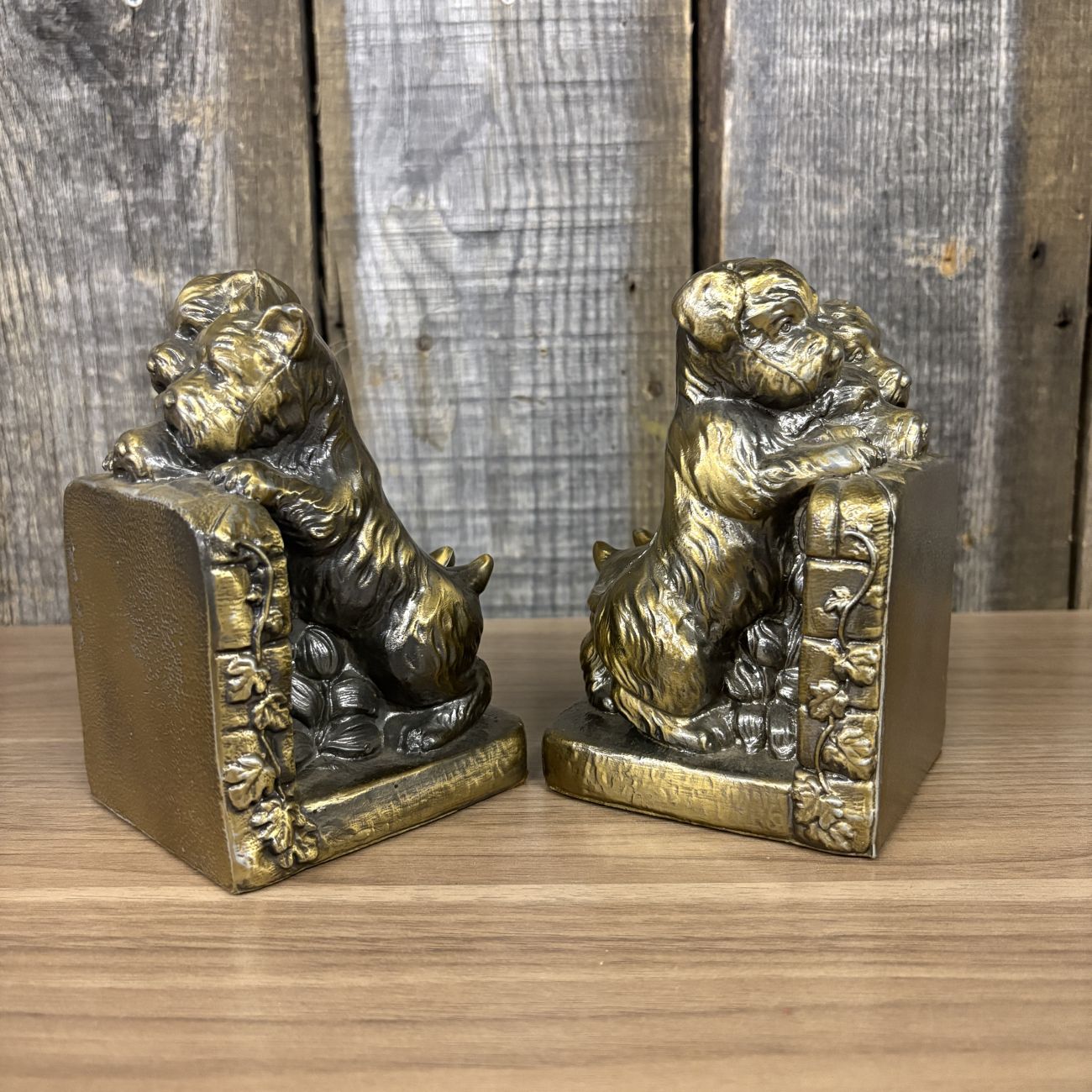 A Pair of Vintage Cast Metal Terrier and Puppy Bookends with Gold Toned Finish