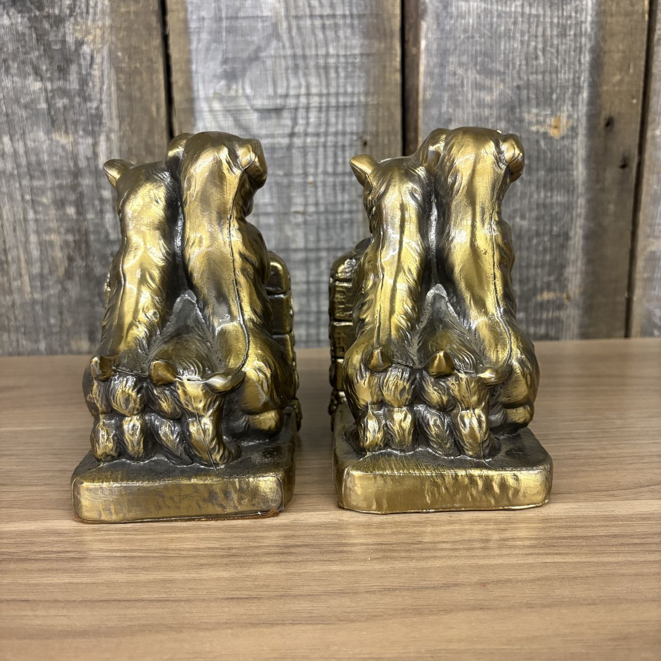 A Pair of Vintage Cast Metal Terrier and Puppy Bookends with Gold Toned Finish
