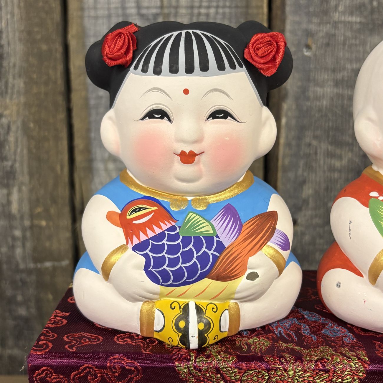 A Pair of Wuxi Huishan Da A Fu Clay Figurines in Presentation Box