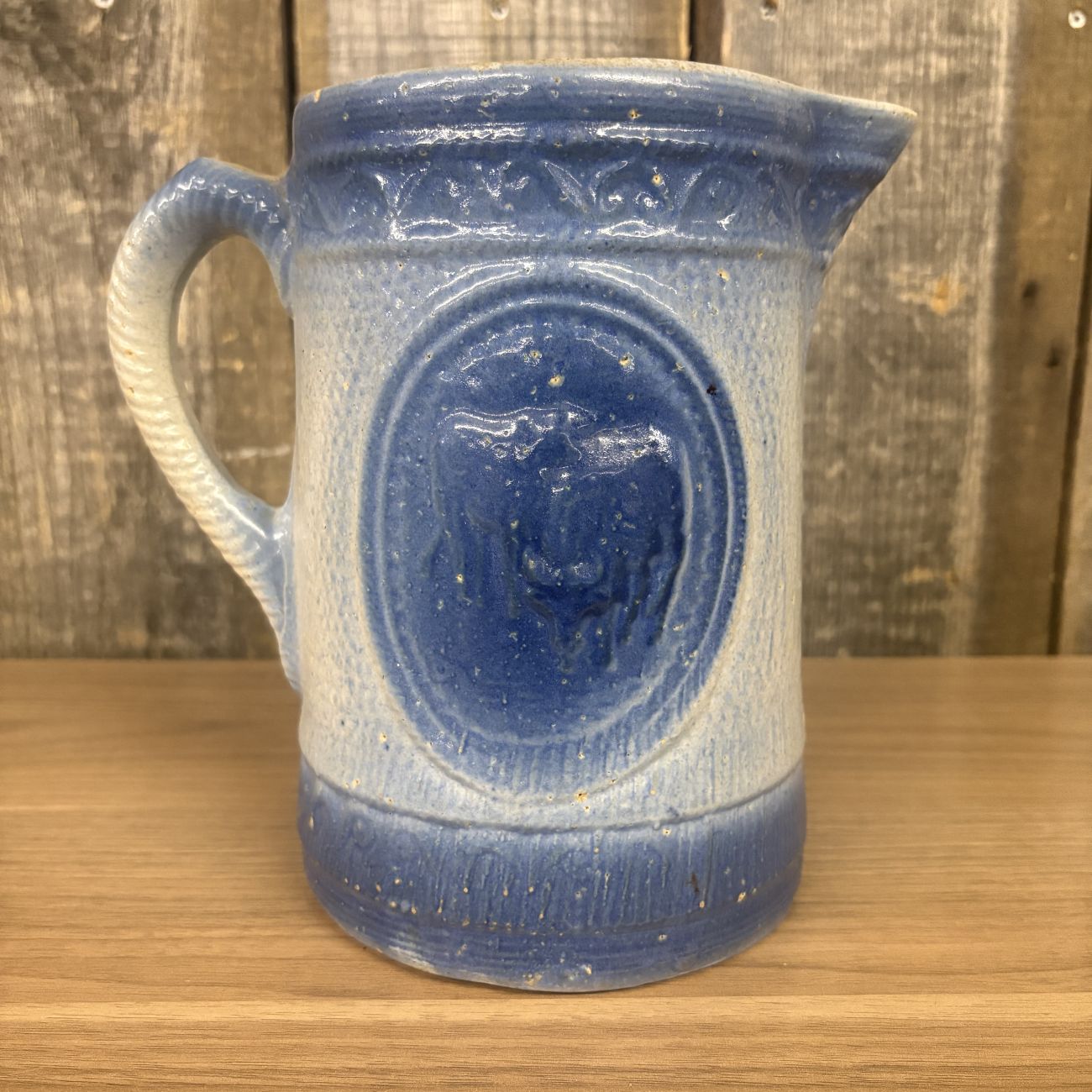 A.E. Hull Blue and White Salt Glaze Stoneware Milk Pitcher with Cow Motif