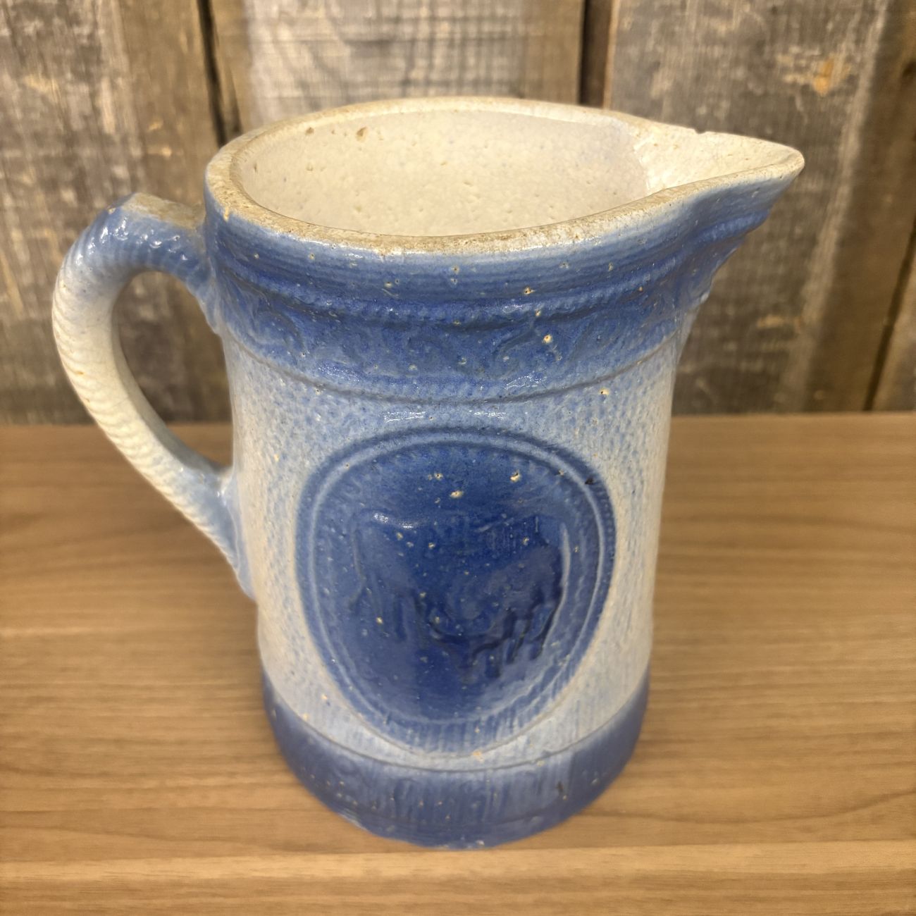 A.E. Hull Blue and White Salt Glaze Stoneware Milk Pitcher with Cow Motif