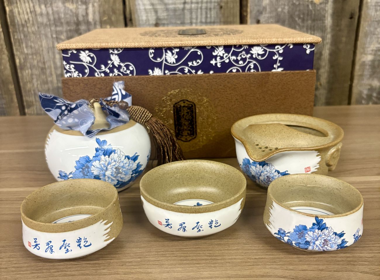 A Set of Ruoshui Tang Blue and White Peony Ceramic Tea Vessels in a Presentation Box