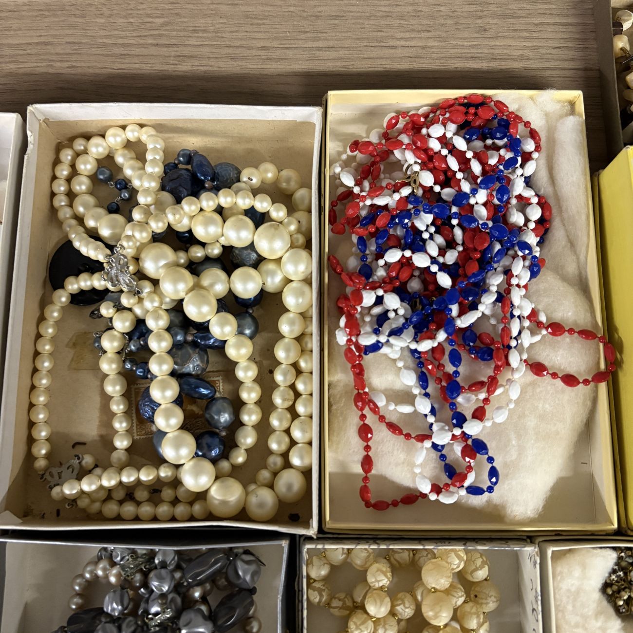 An Assortment of Vintage Costume Jewelry Including Fashion Clip by Regina and Venetian Style Glass Beads